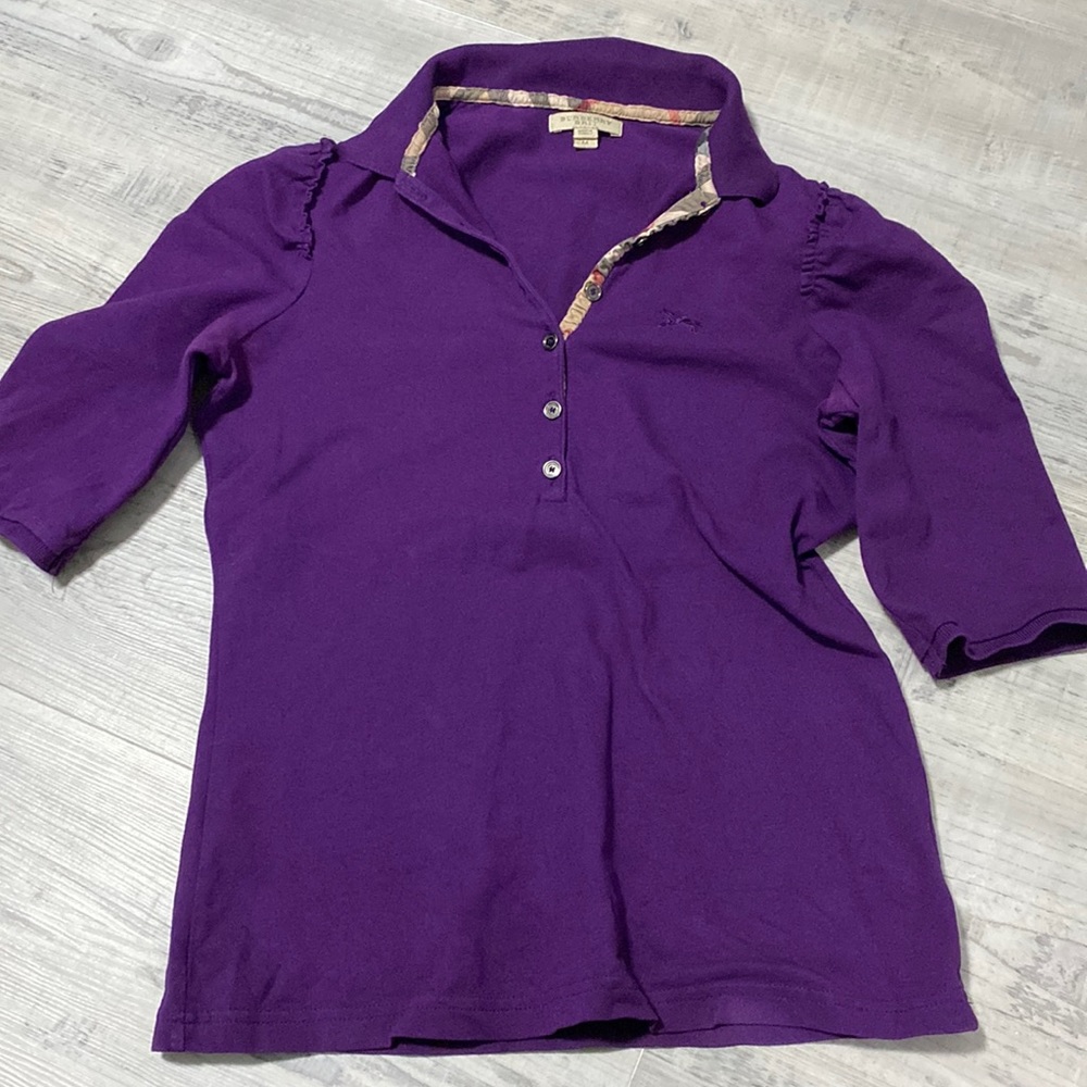 Burberry women’s golf shirt with ruffle shoulders